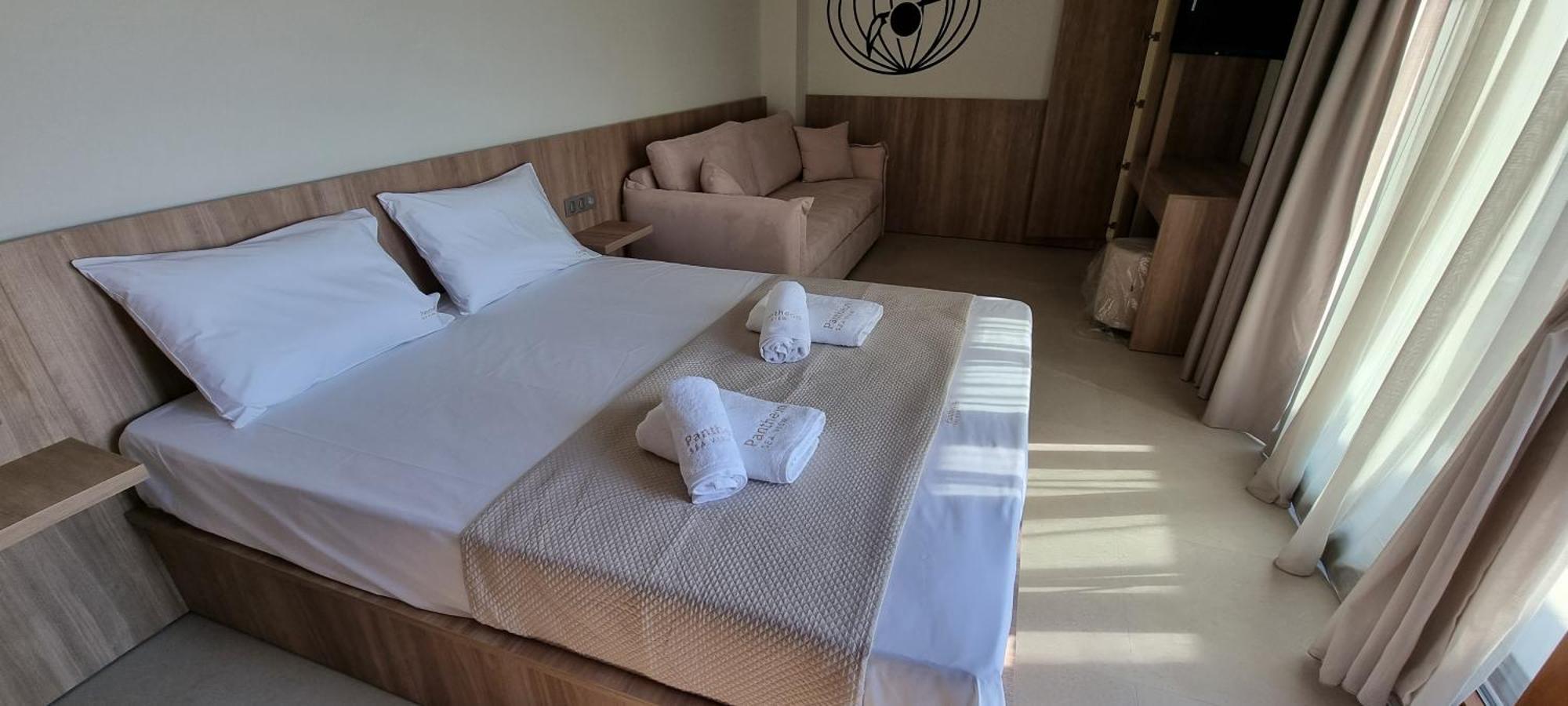 Aparthotel Pantheon Sea View Néoi Póroi Pokoj fotografie
